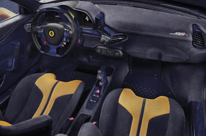 The cabin has a distinctive racing-inspired atmosphere.